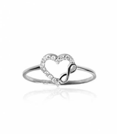 Anillo corazón de circonitas e infinito de oro blanco 18k.