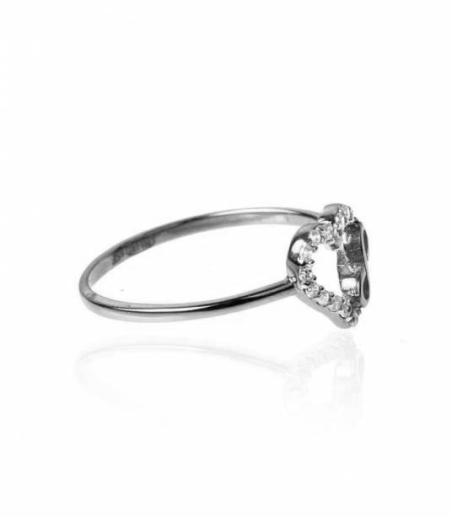 Anillo corazón de circonitas e infinito de oro blanco 18k.