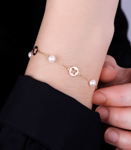 PULSERA "PARADISE" ORO 18K