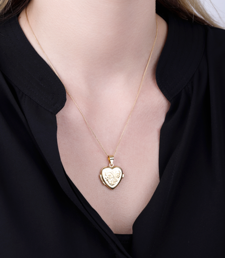 Colgante guardafoto corazón oro 18k