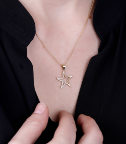 COLGANTE "GLENDALE" ESTRELLA DE MAR ORO 18K